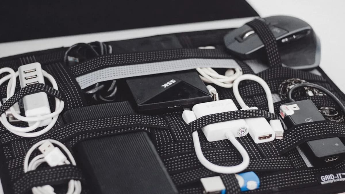 a black case filled with electronics and cords