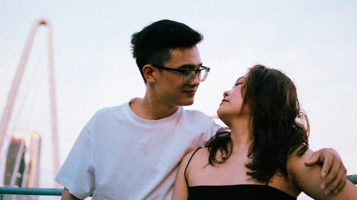 a man and a woman standing next to each other