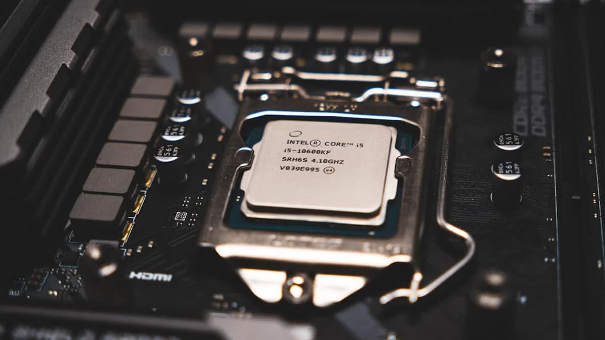 A cpu chip sitting on top of a computer