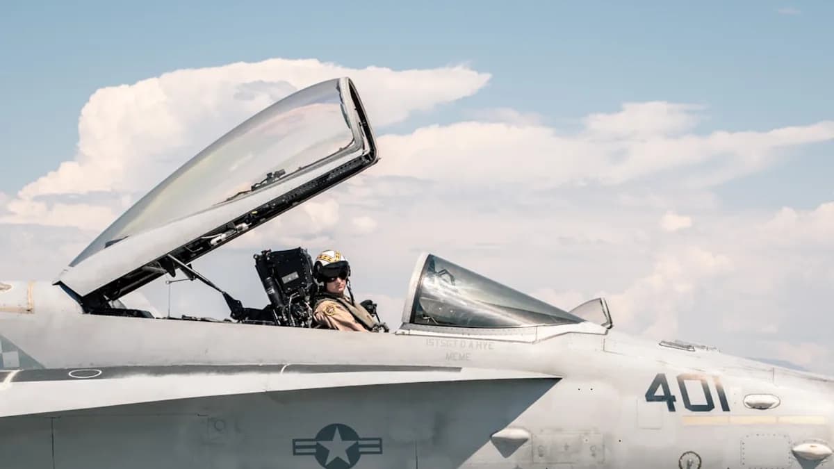 a couple of men in a jet