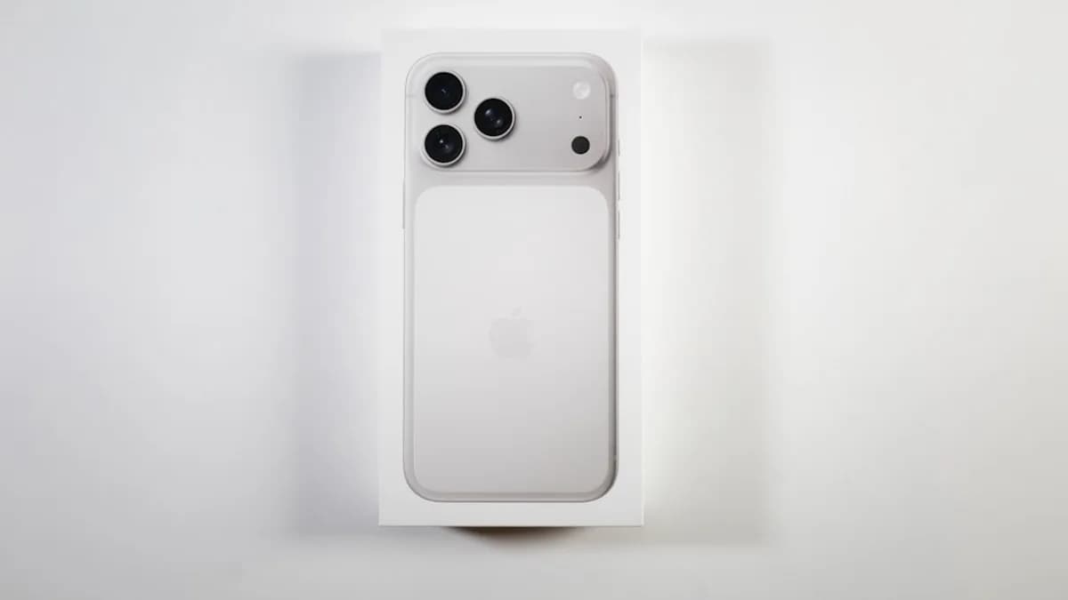 A white smartphone box with a phone inside