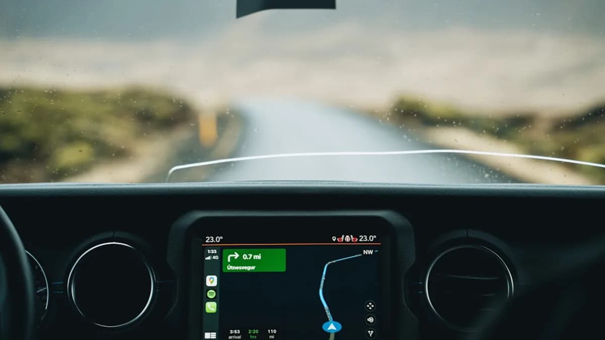 the dashboard of a car with a gps device