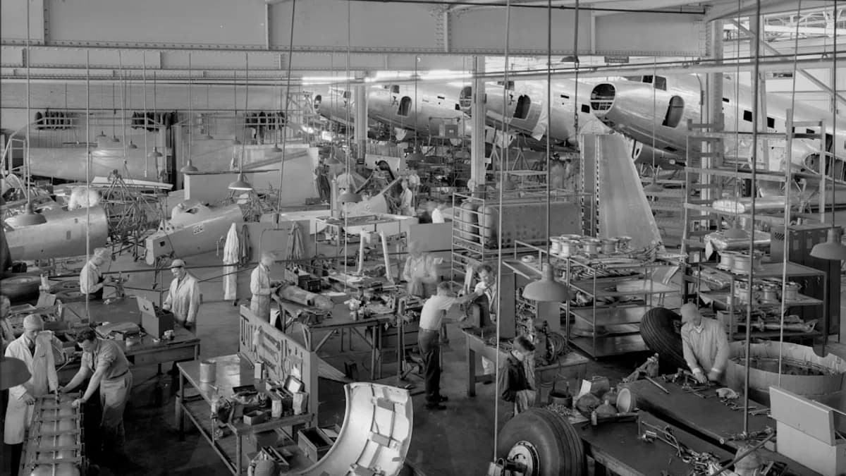 a black and white photo of a factory
