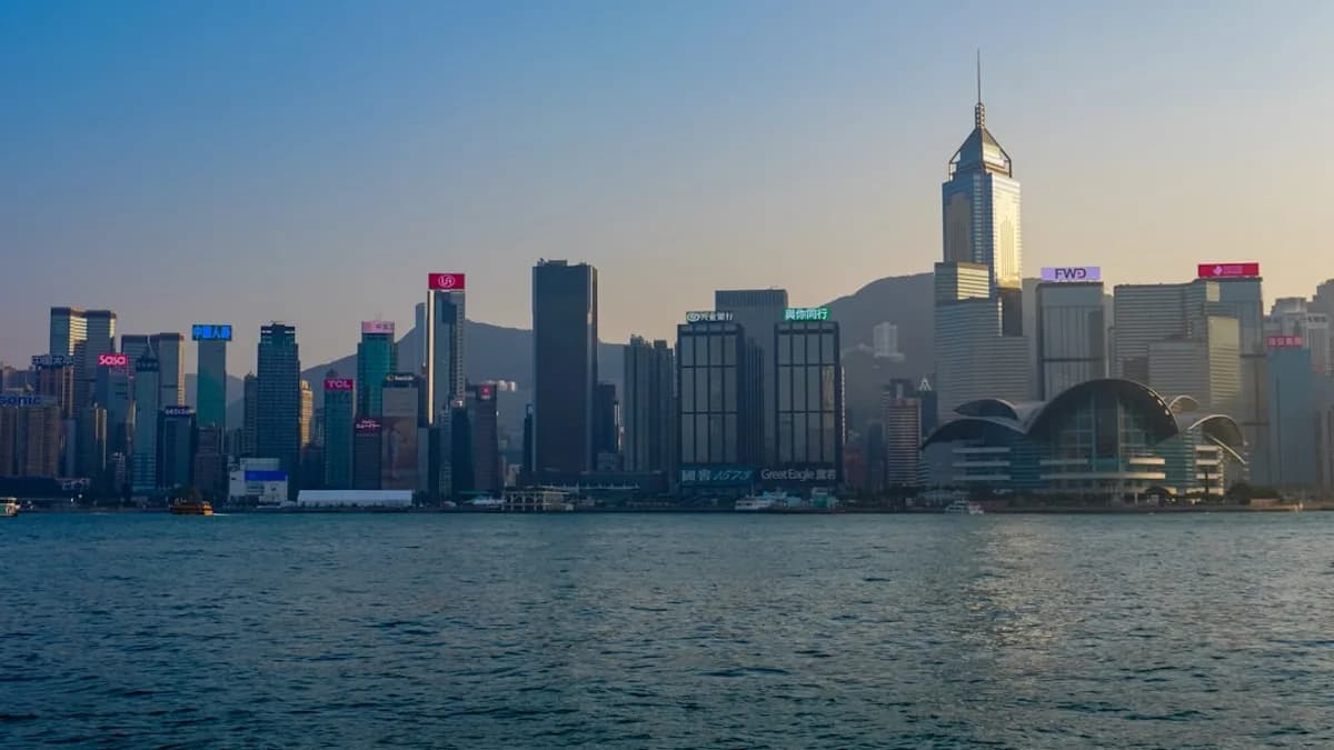 Modern cityscape with skyscrapers across the water
