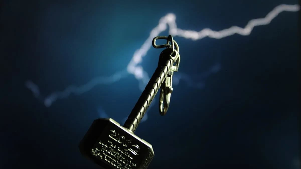 silver skeleton key with black and silver key