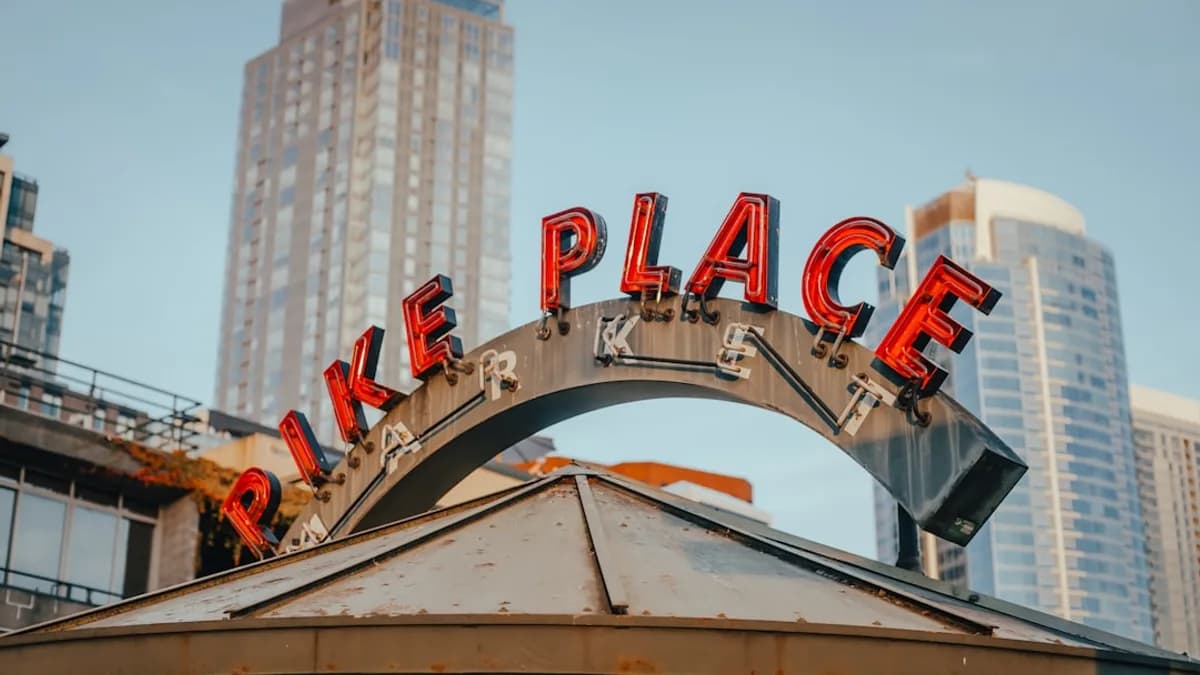 A large sign that says take place on top of a building