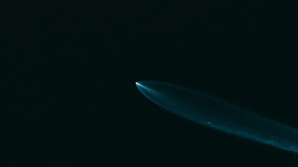 A close up of a surfboard in the dark