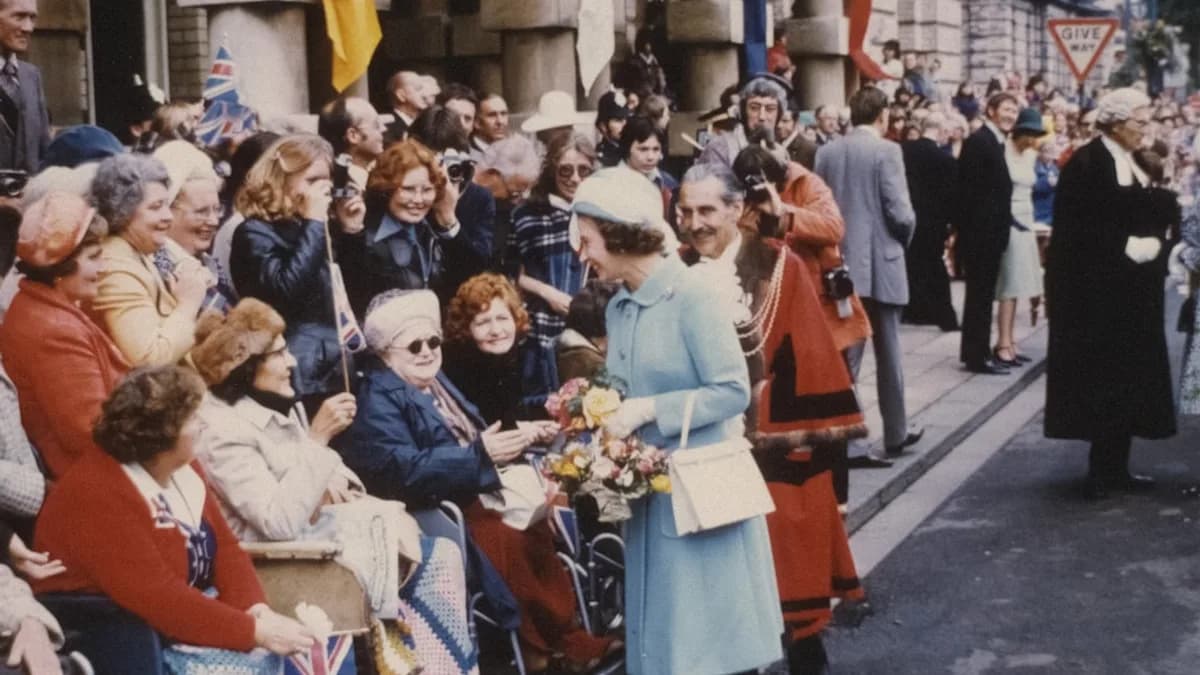 a woman in a blue coat is standing in front of a crowd of people