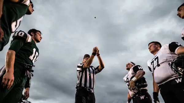 group of people in white and black shirts