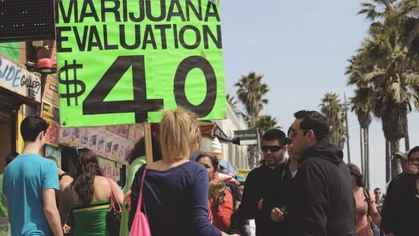 woman holding banner