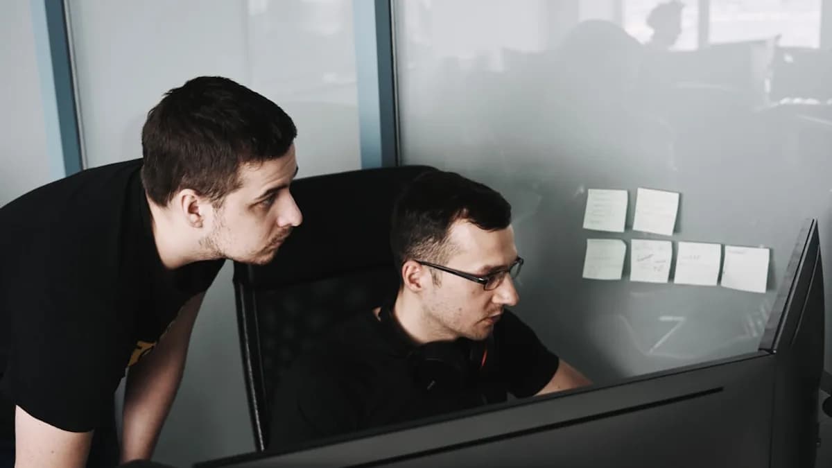 man in black tank top wearing eyeglasses