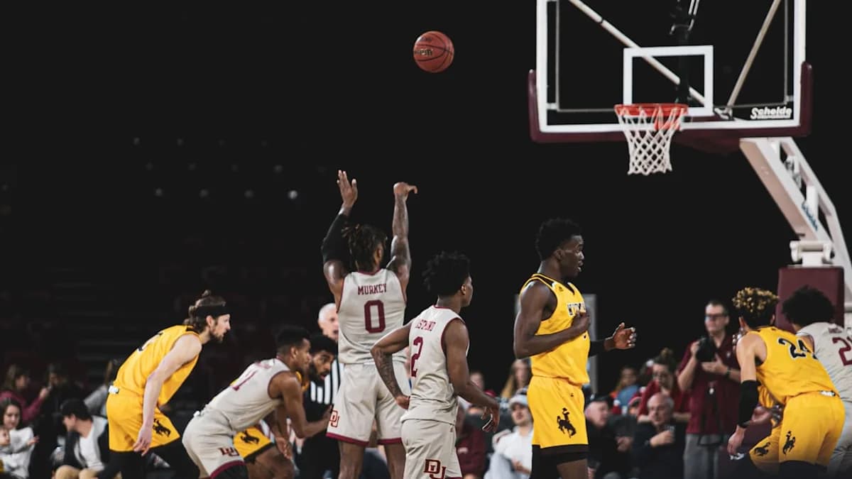 man shooting the ball on the free throw line