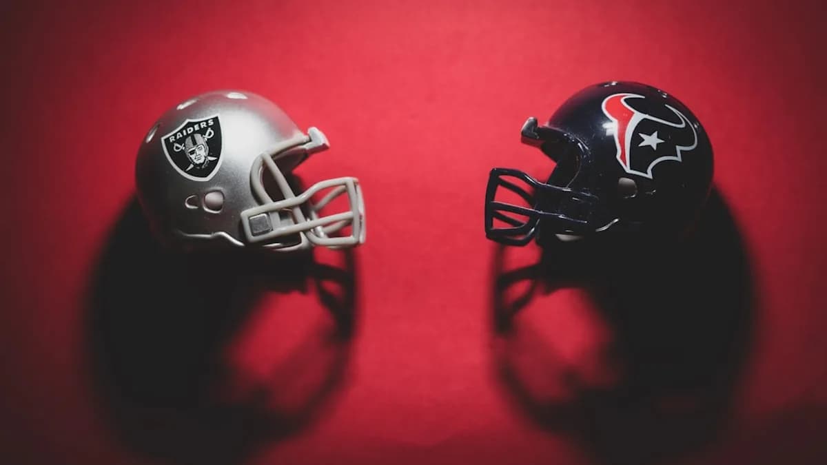black and red helmet on red textile