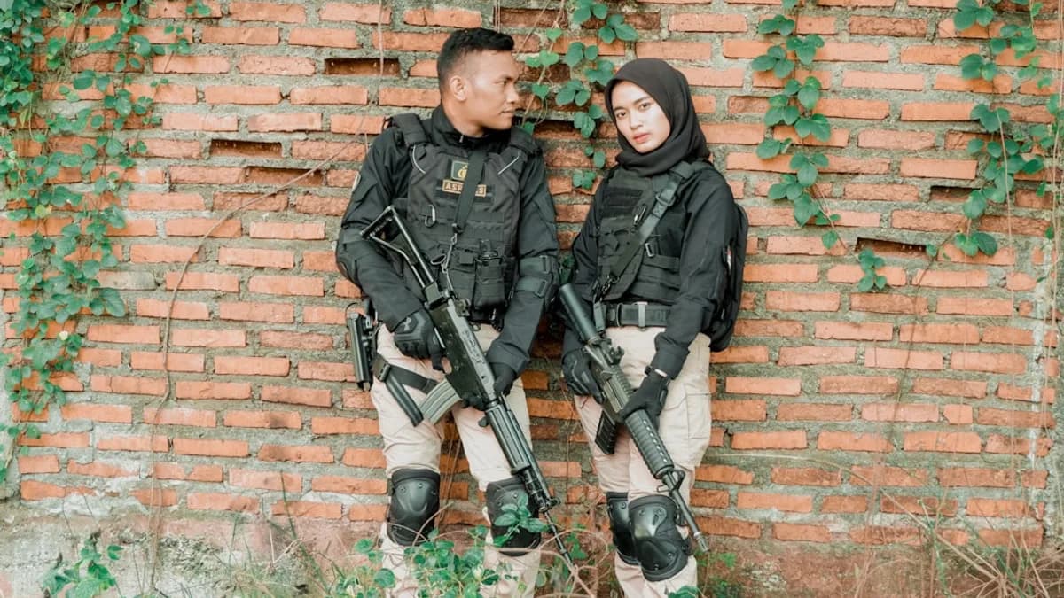two people in uniform