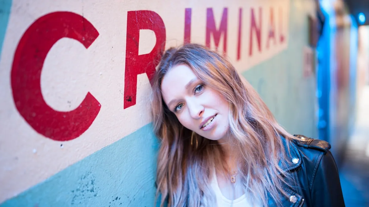 woman wearing black leather jacket