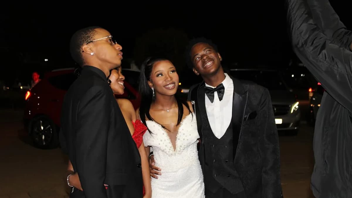 Young people dressed formally at night