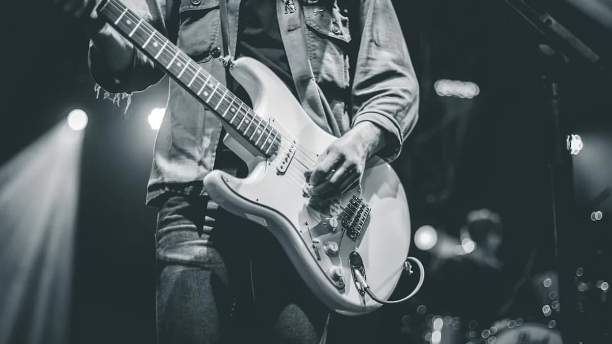 man playing electric guitar