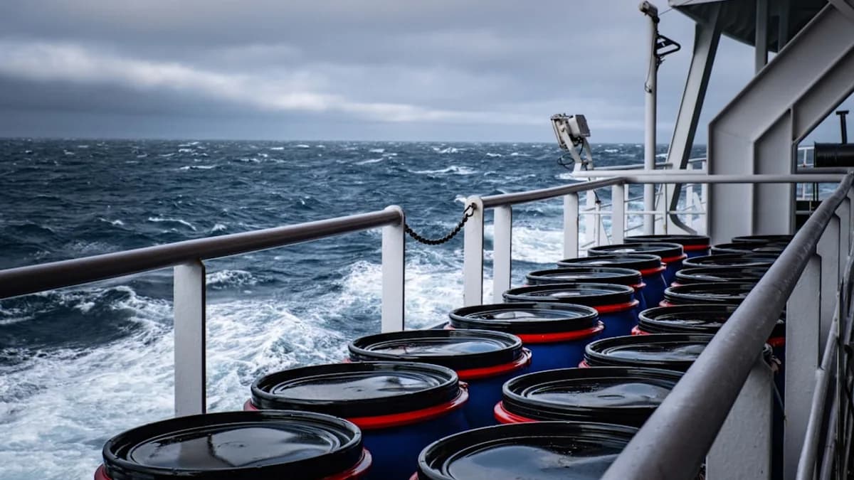 A row of buckets sitting on the side of a boat