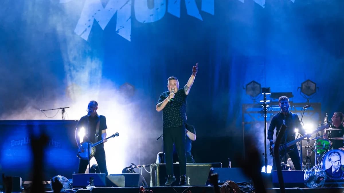 A group of people standing on top of a stage
