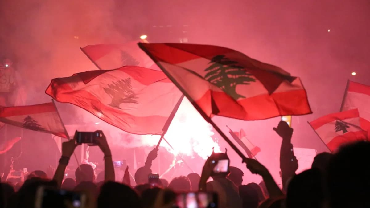 people raising flags during night time