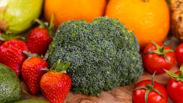 red strawberries and yellow citrus fruits
