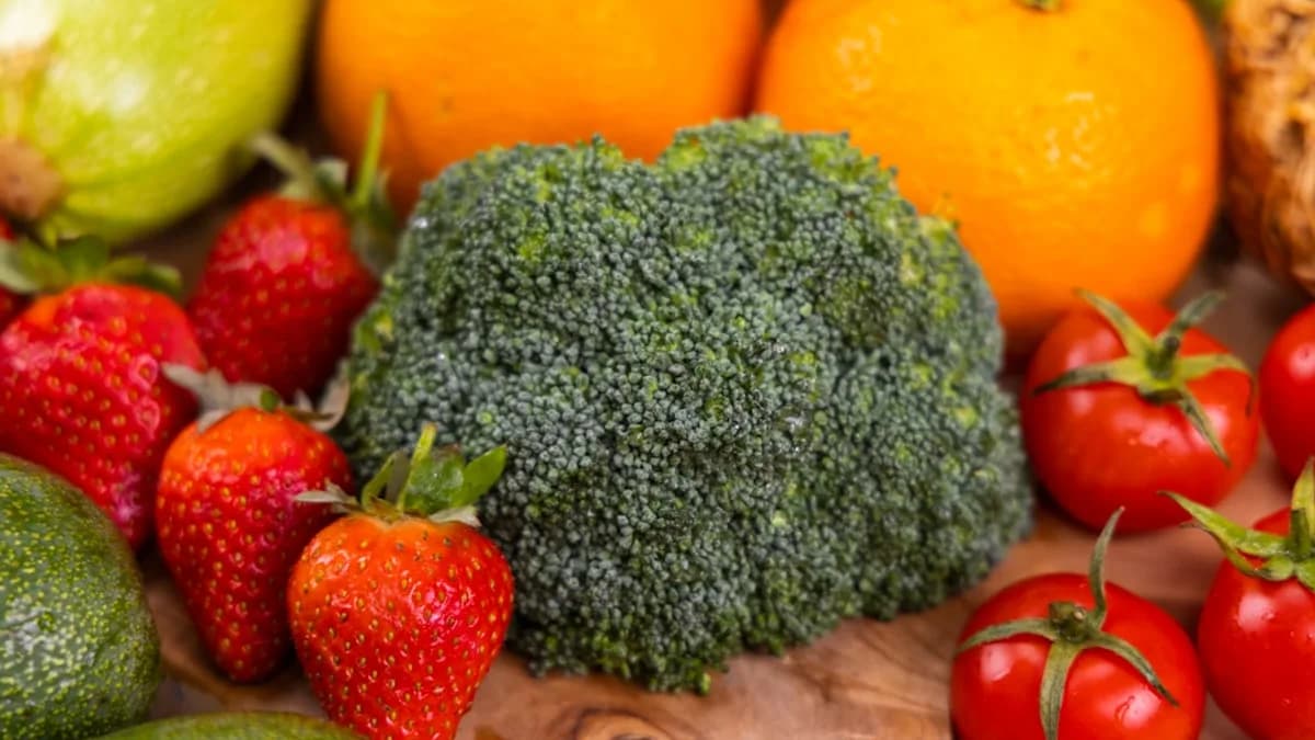 red strawberries and yellow citrus fruits