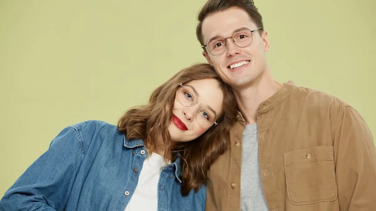 A man and a woman posing for a picture
