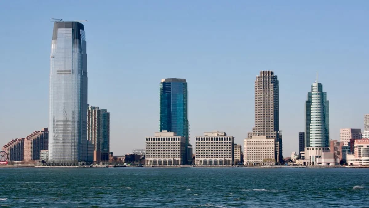 a city skyline with tall buildings