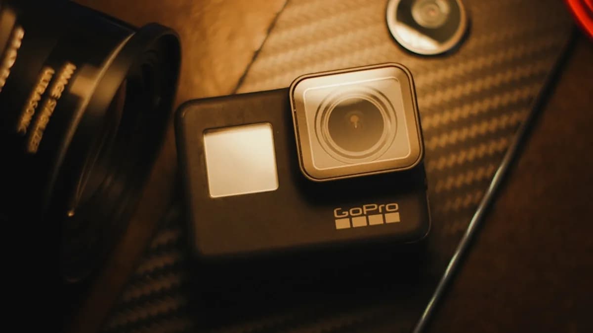 a tripod with a camera attached to it