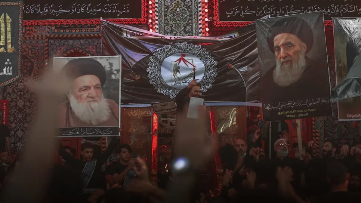 a large group of people holding up banners