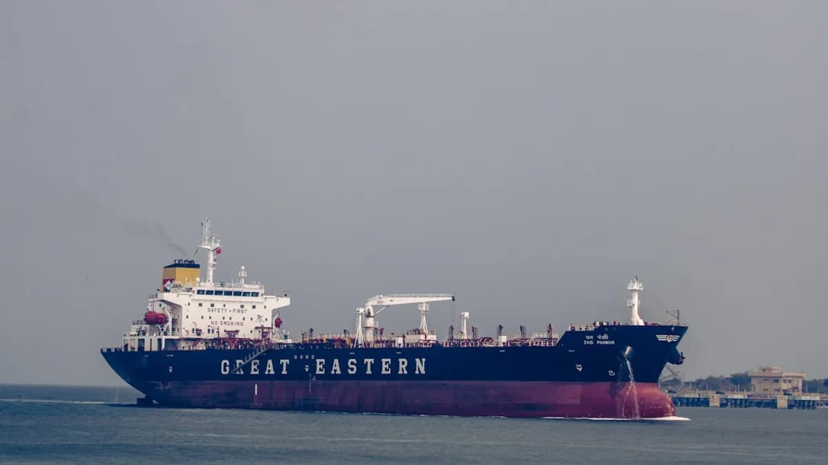 a large cargo ship in the middle of the ocean