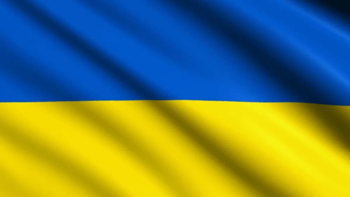 the flag of ukraine is waving in the wind