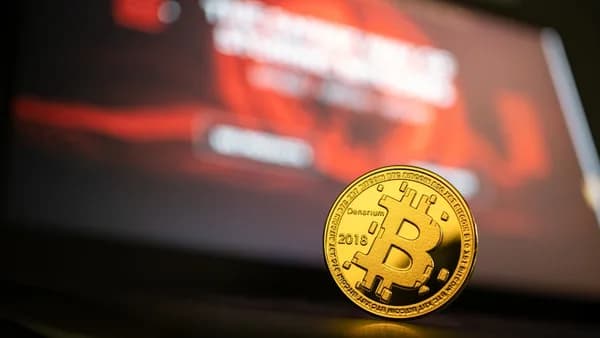 round gold-colored bit coin