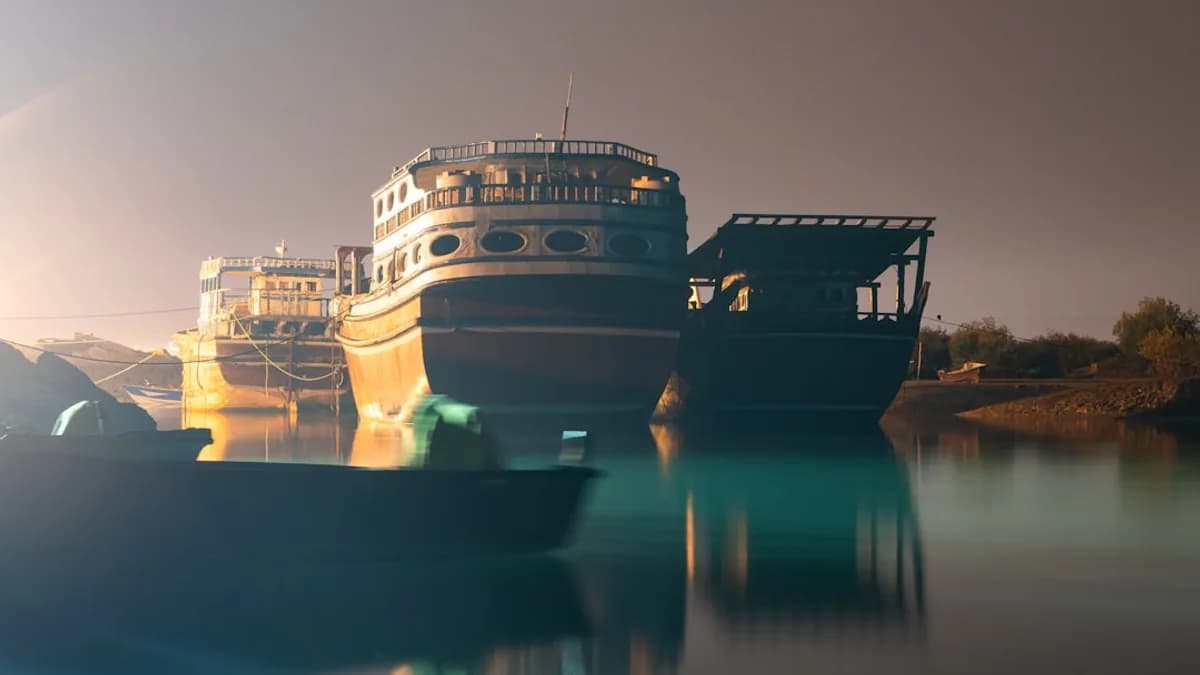 white and black ship on water during night time