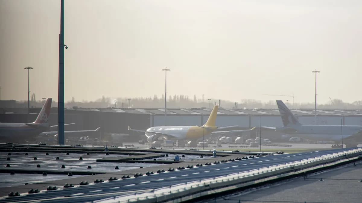 an airport filled with lots of parked airplanes