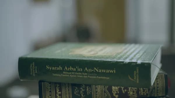 A stack of books sitting on top of a table