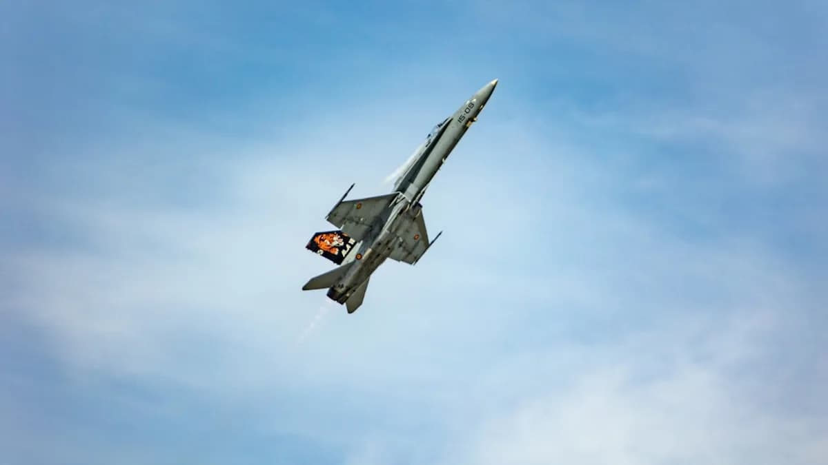a fighter jet flying through the air