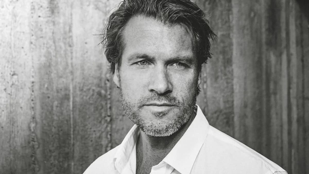 man in white collared shirt