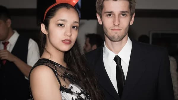 A man and a woman standing next to each other