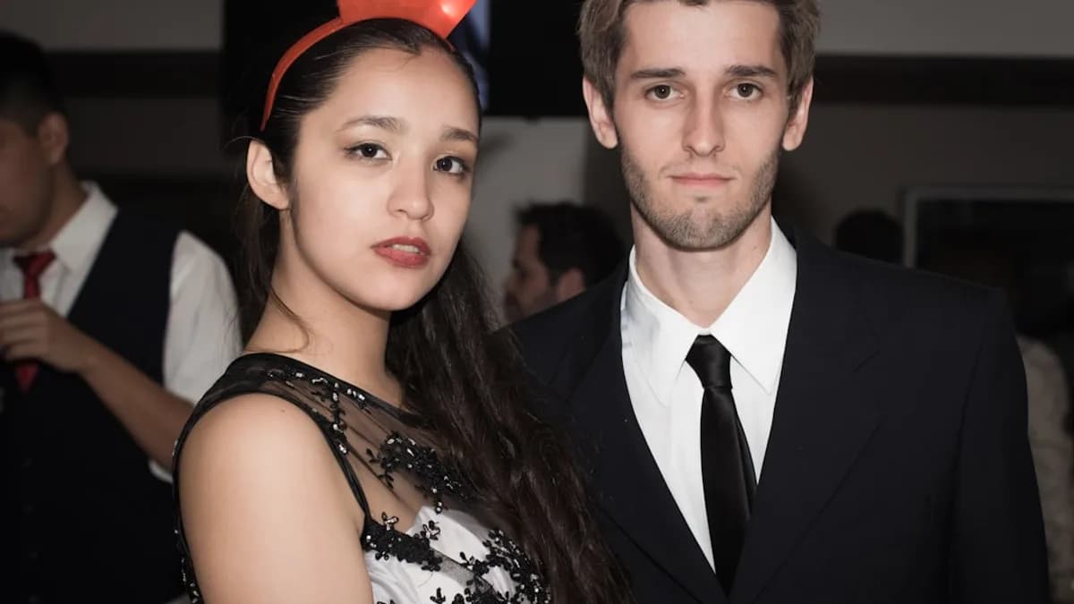 A man and a woman standing next to each other