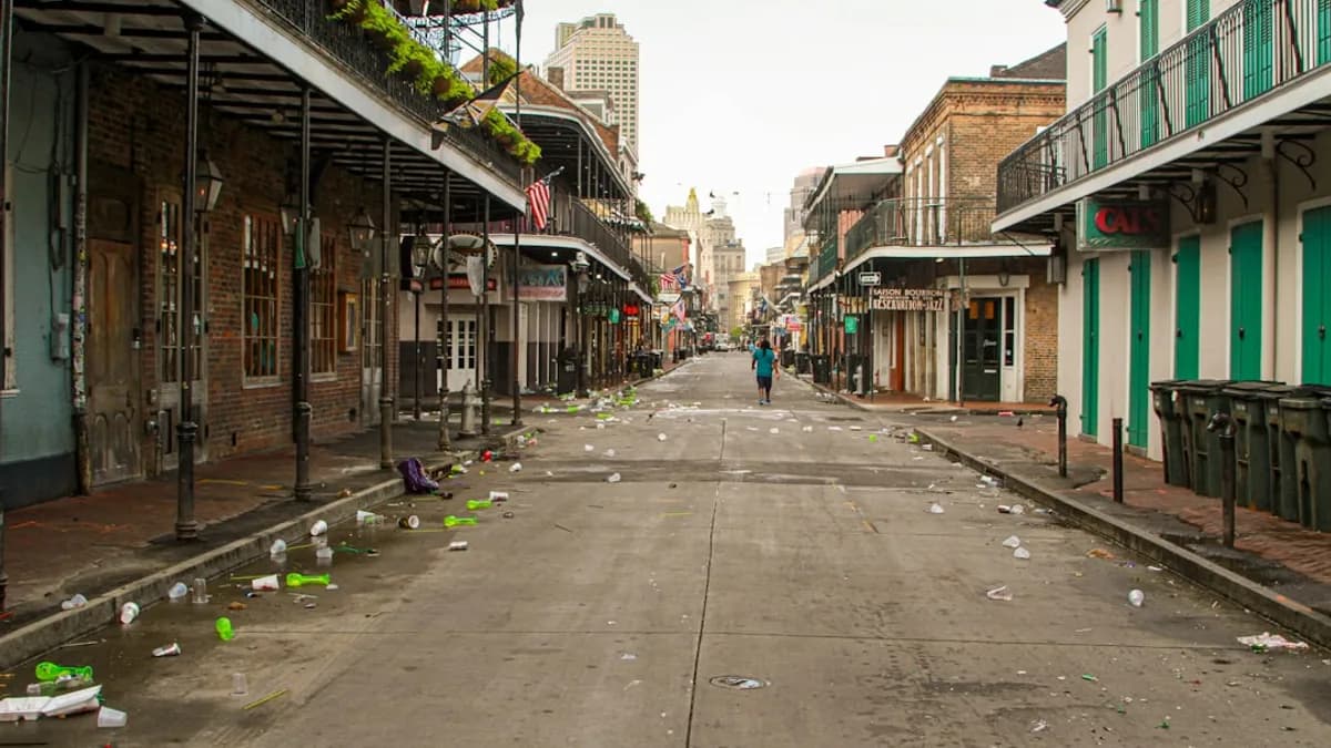 people walking on sidewalk near buildings during daytime
