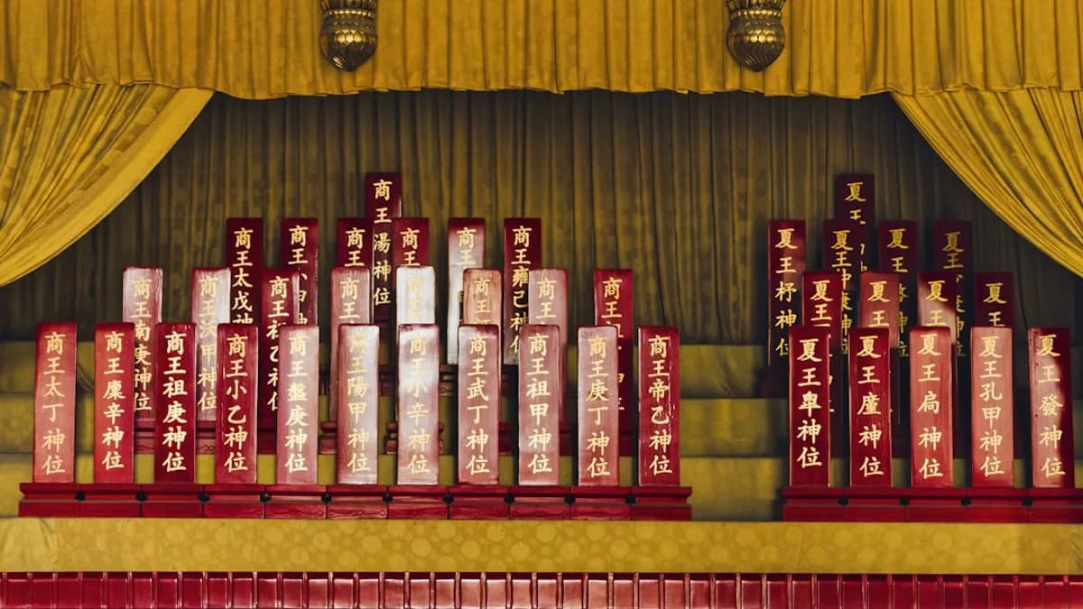 Ancestral tablets displayed on a golden altar.
