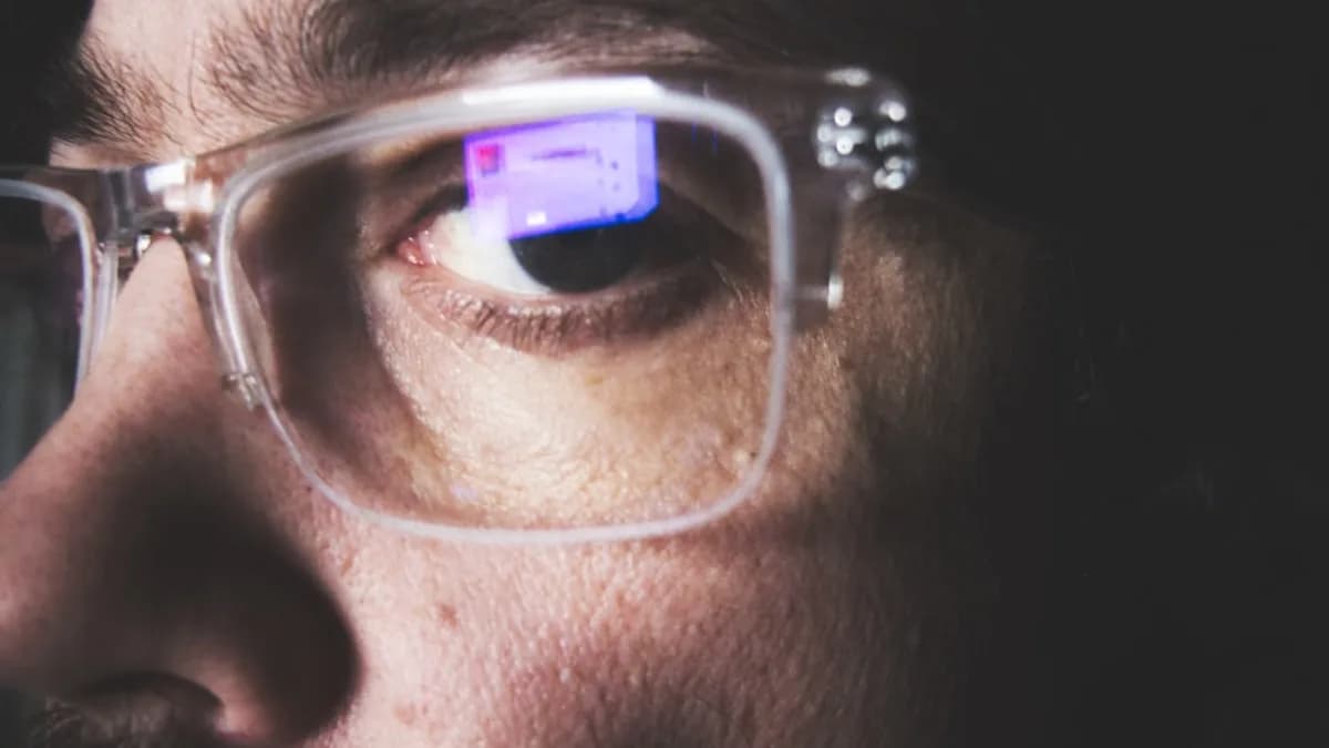 man wearing silver framed eyeglasses