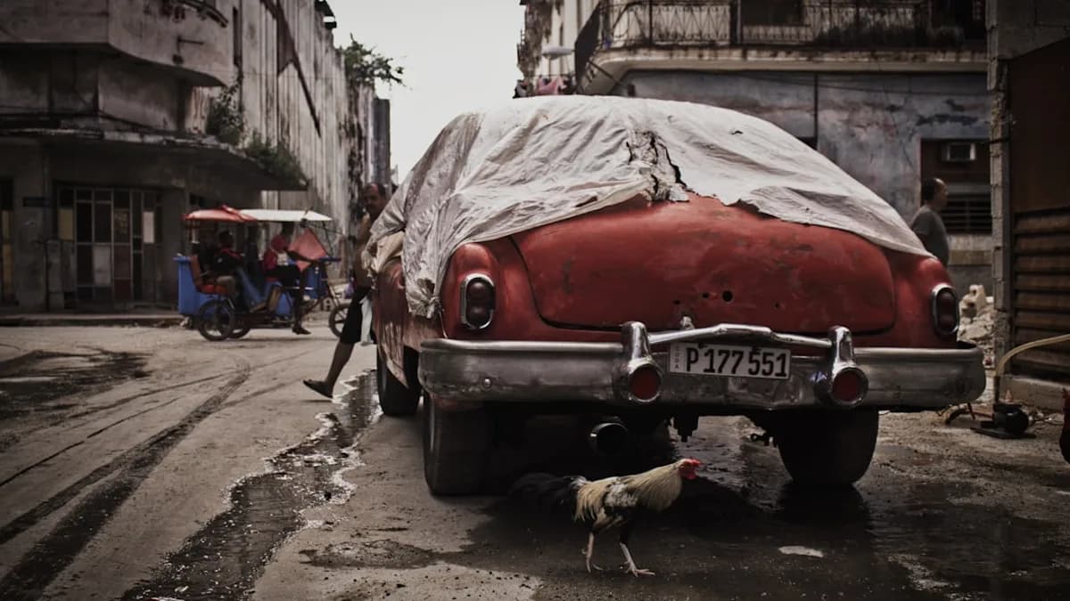 photo of red classic car