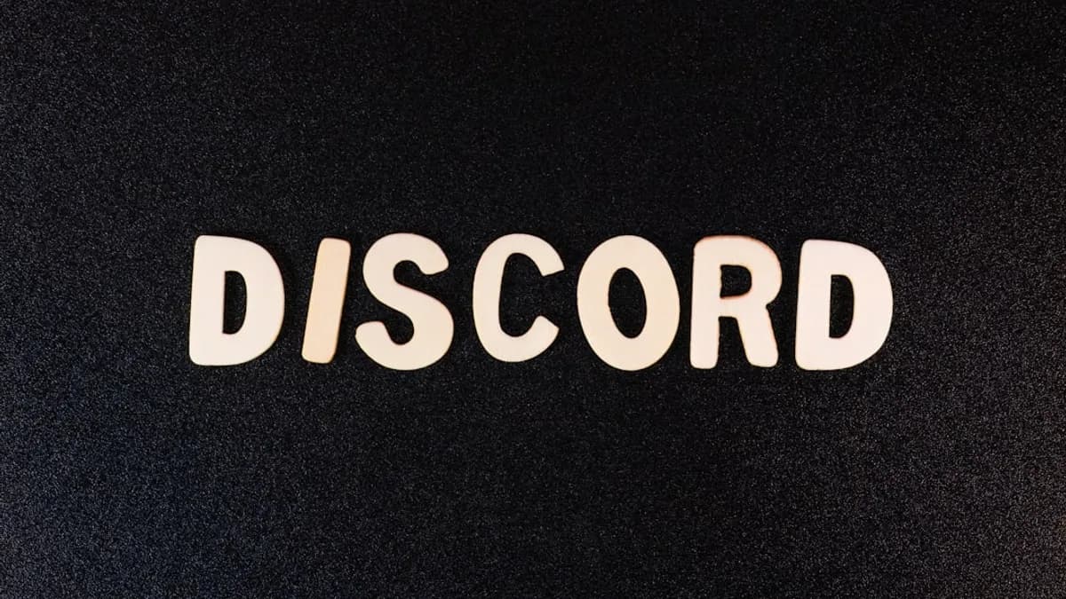 a close up of a word that reads discord