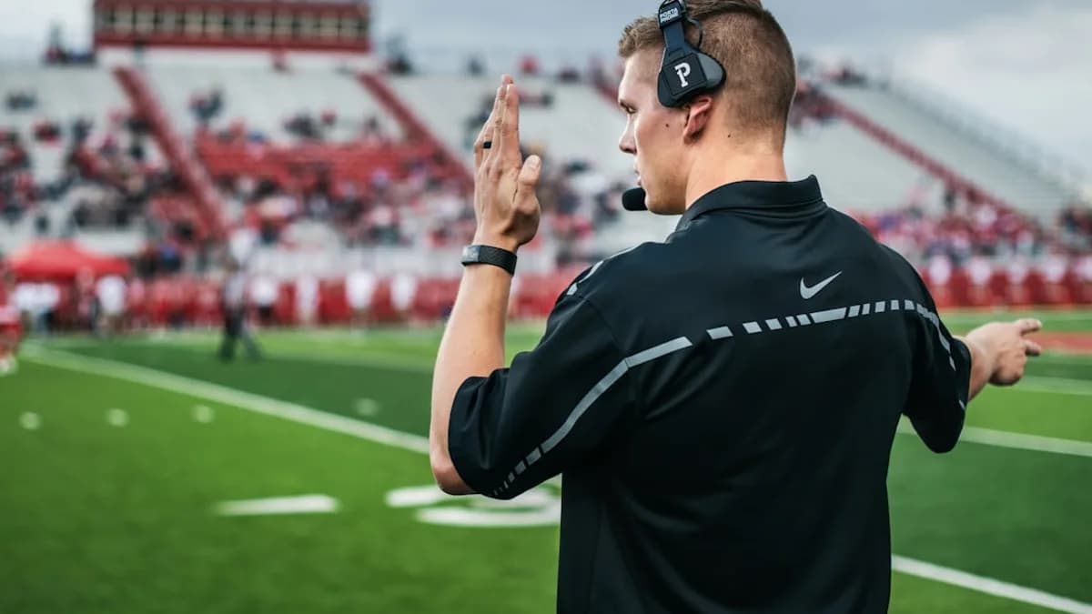 man in black crew neck t-shirt wearing black sunglasses