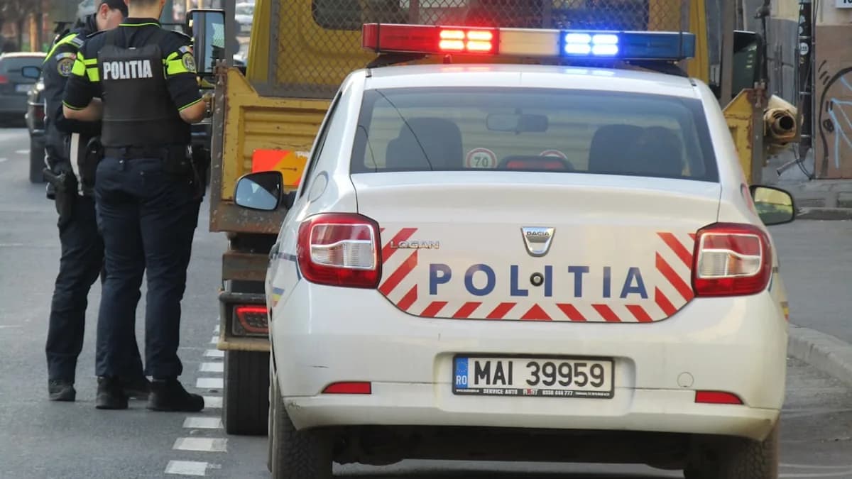 A police car parked on the side of the road