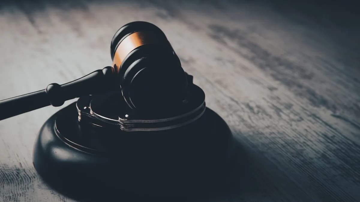 a judge's gaven on a wooden table