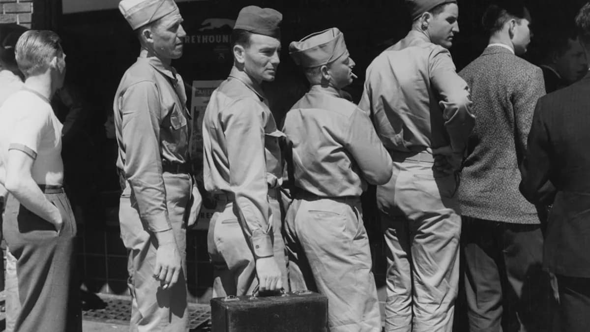 Men in military uniforms standing in line
