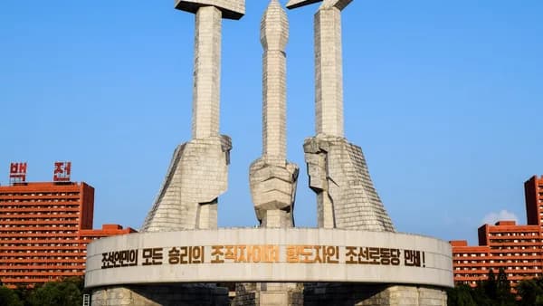 white concrete building under blue sky during daytime